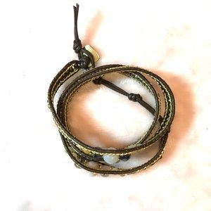 Nakamol 20-22 Inch Wrap Bracelet on brown leather.